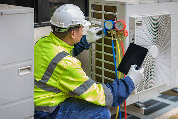 Professional Heat Pump Repair technician working in Bonsall, CA